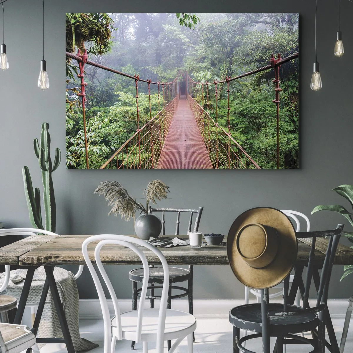 Bild auf Leinwand - Leinwandbild - Eine Hängebrücke in einem tropischen Dschungel, umgeben von Nebel - 70x50cm - Über den Kronen aufgehängt - Moderne Wanddekoration für Wohnzimmer und Schlafzimmer ARTTOR