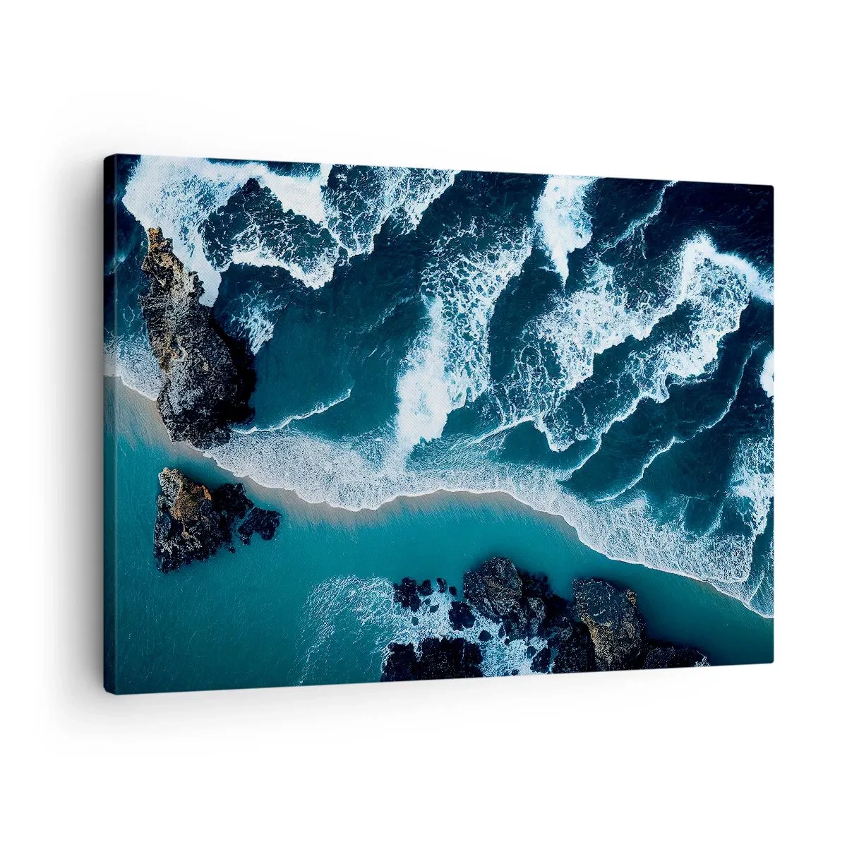 Bild auf Leinwand - Leinwandbild - Luftaufnahme der Wellen, die an die Küste krachen - 70x50cm - In Wellen gehüllt - Moderne Wanddekoration für Wohnzimmer und Schlafzimmer ARTTOR