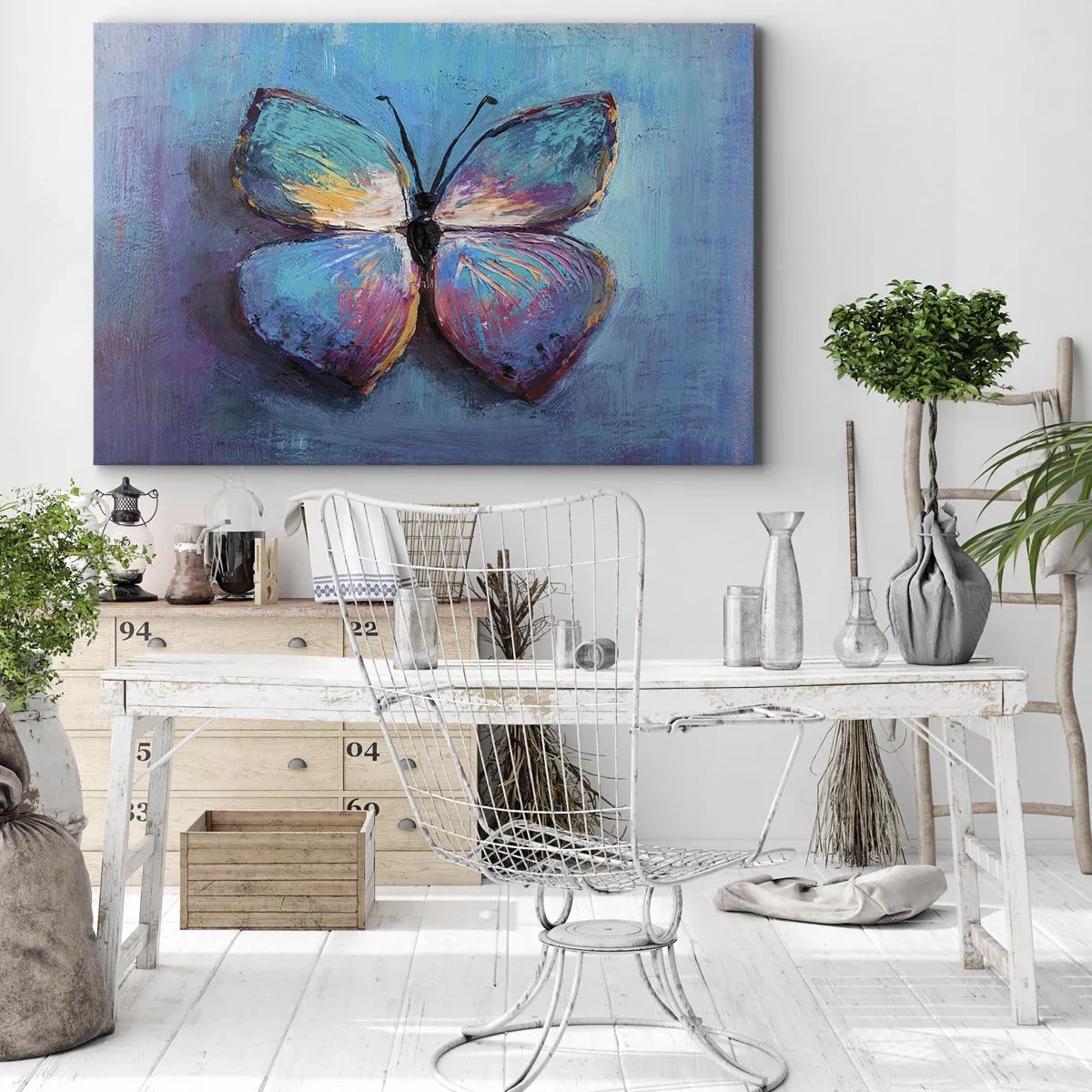 Bild auf Leinwand - Leinwandbild - Bunter Schmetterling auf blauem Hintergrund - 70x50cm - In all seiner Pracht - Moderne Wanddekoration für Wohnzimmer und Schlafzimmer ARTTOR
